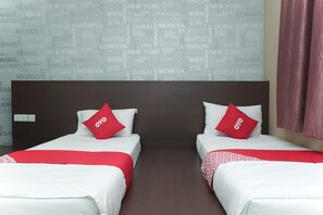 Habitación Deluxe con 2 camas individuales | Wifi gratis y ropa de cama