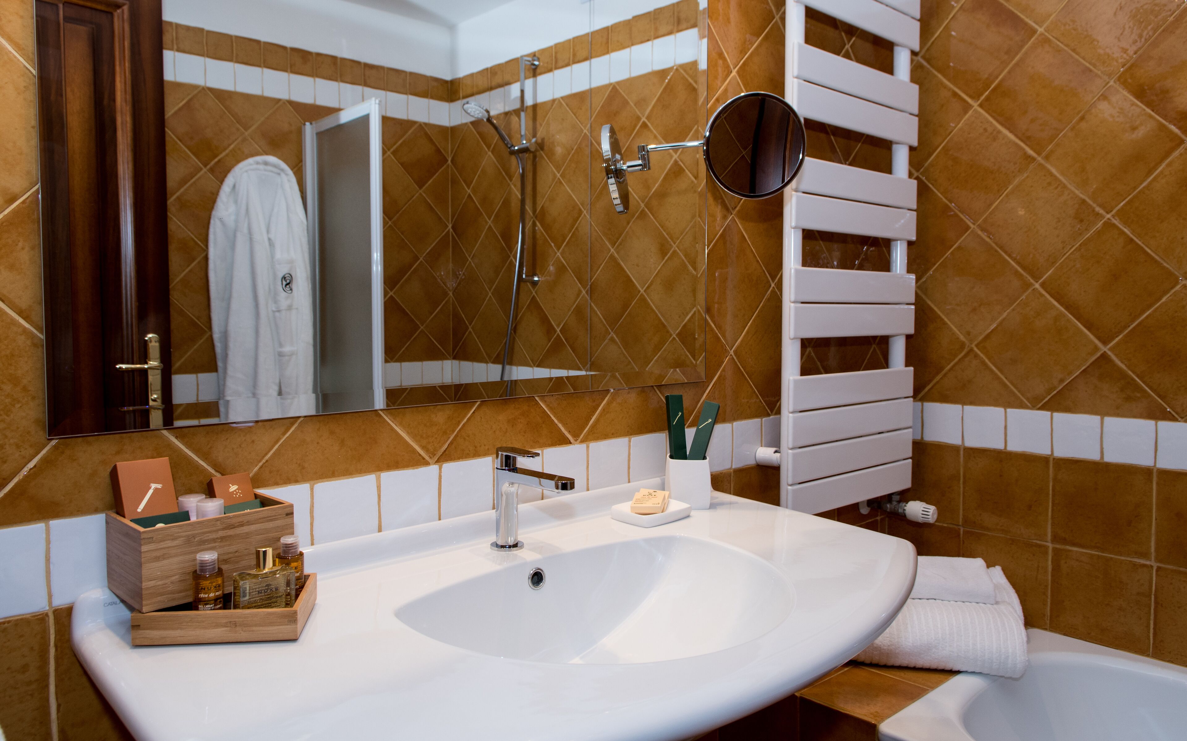 free toiletries, hair dryer, slippers, bidet