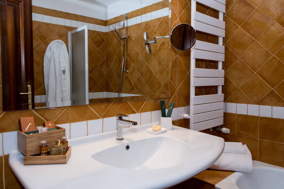 free toiletries, hair dryer, slippers, bidet