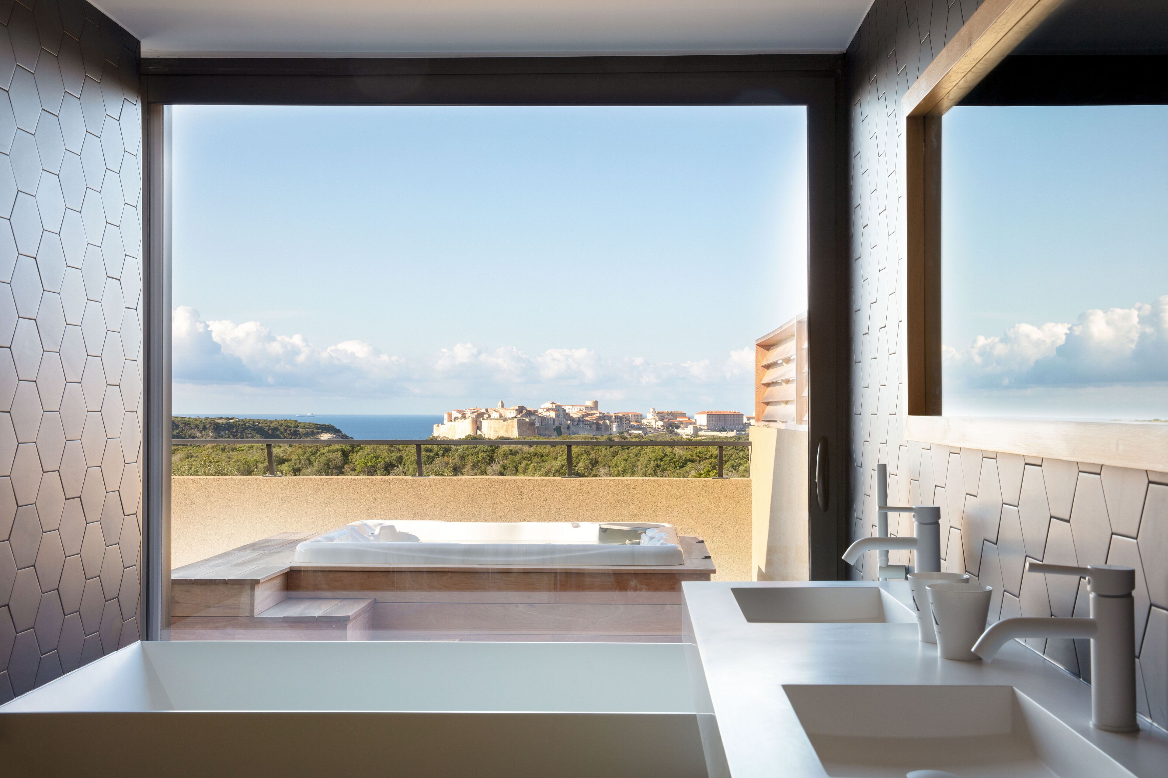 grand suite (citadelle view) | bathroom | shower, designer toiletries, hair dryer, bathrobes
