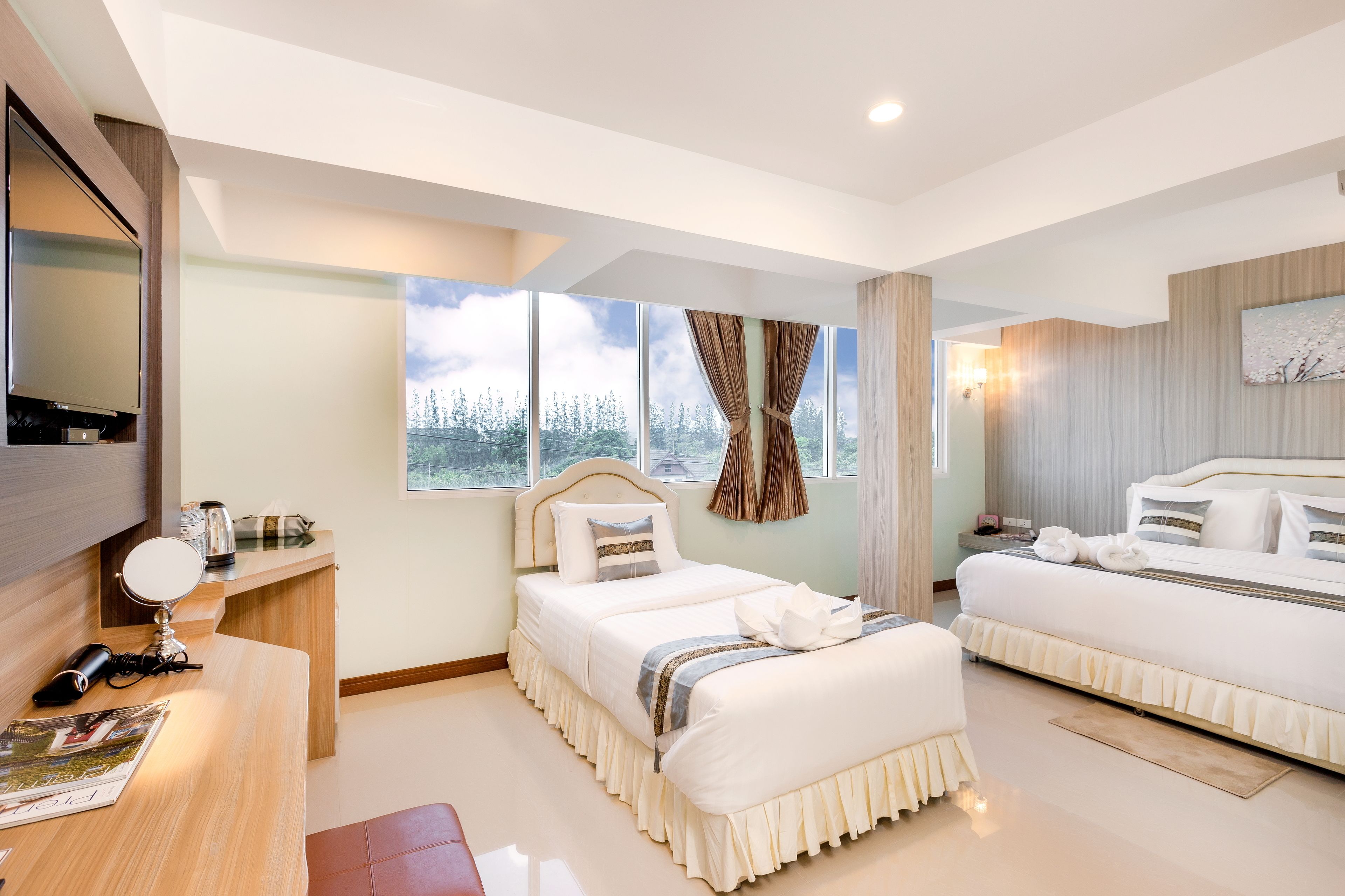 family suite room with bathtub | desk, laptop workspace, blackout curtains, free wifi