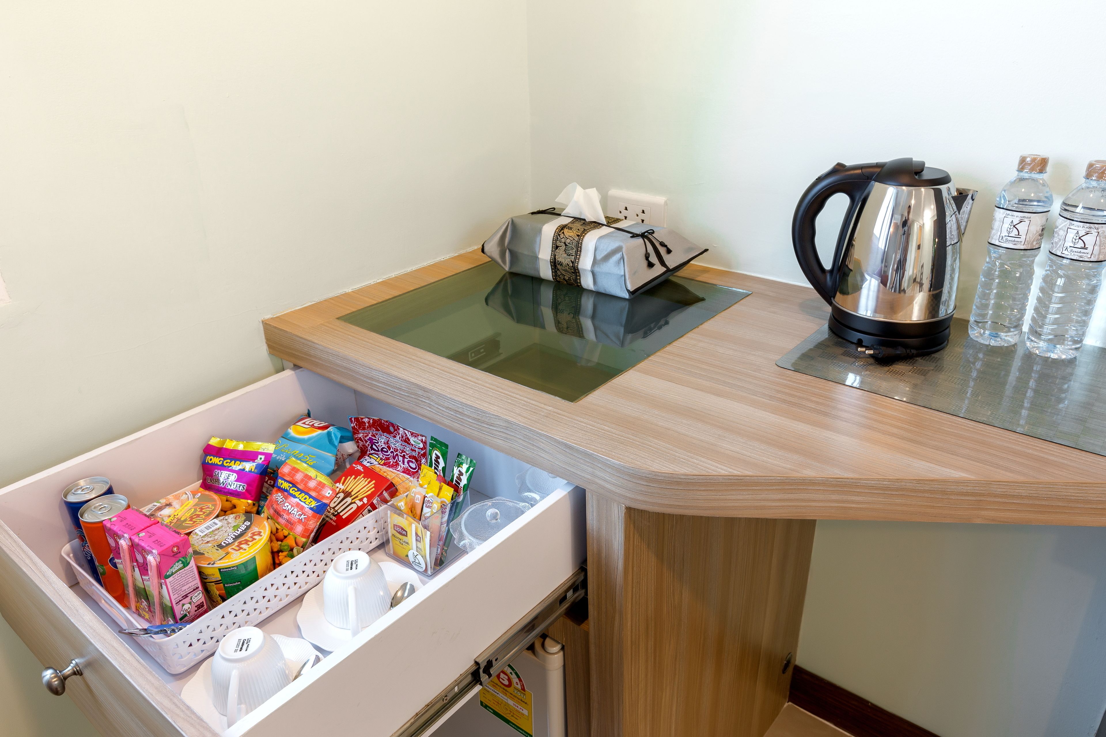 suite room with bathtub | mini fridge