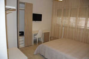 Ropa de cama de alta calidad y minibar 