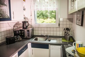 Luxury Apartment, 3 Bedrooms, Non Smoking, Patio | Private kitchen | Fridge, microwave, oven, stovetop