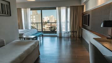 Deluxe Quadruple Room | 1 bedroom, premium bedding, pillowtop beds, minibar