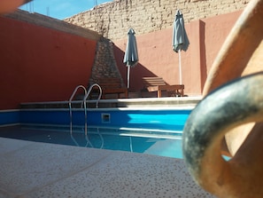 Outdoor pool, pool umbrellas, pool loungers