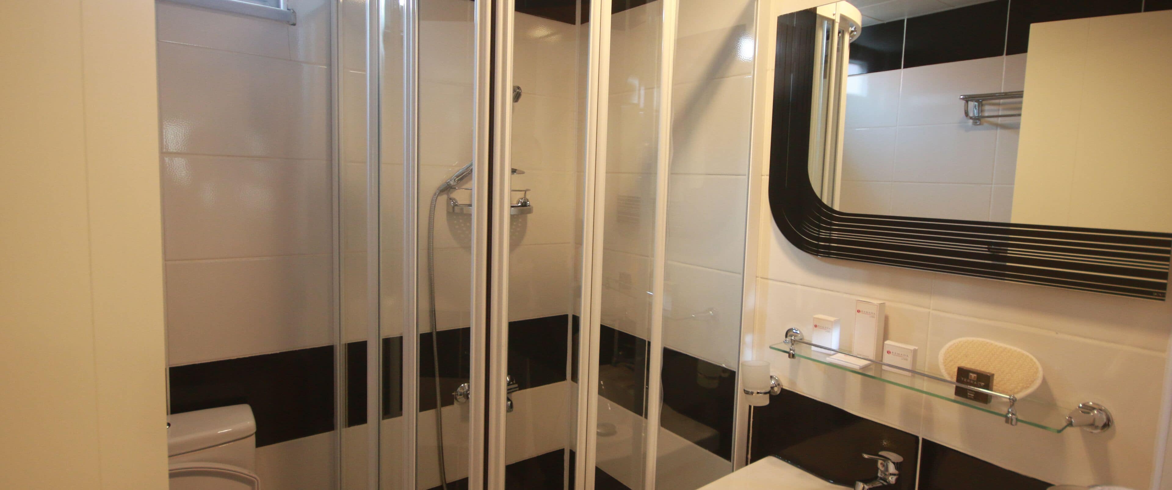 shower, free toiletries, hair dryer, slippers