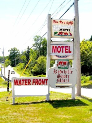 A motel sign with 'The Redclyffe' and 'Water Front' written on it.