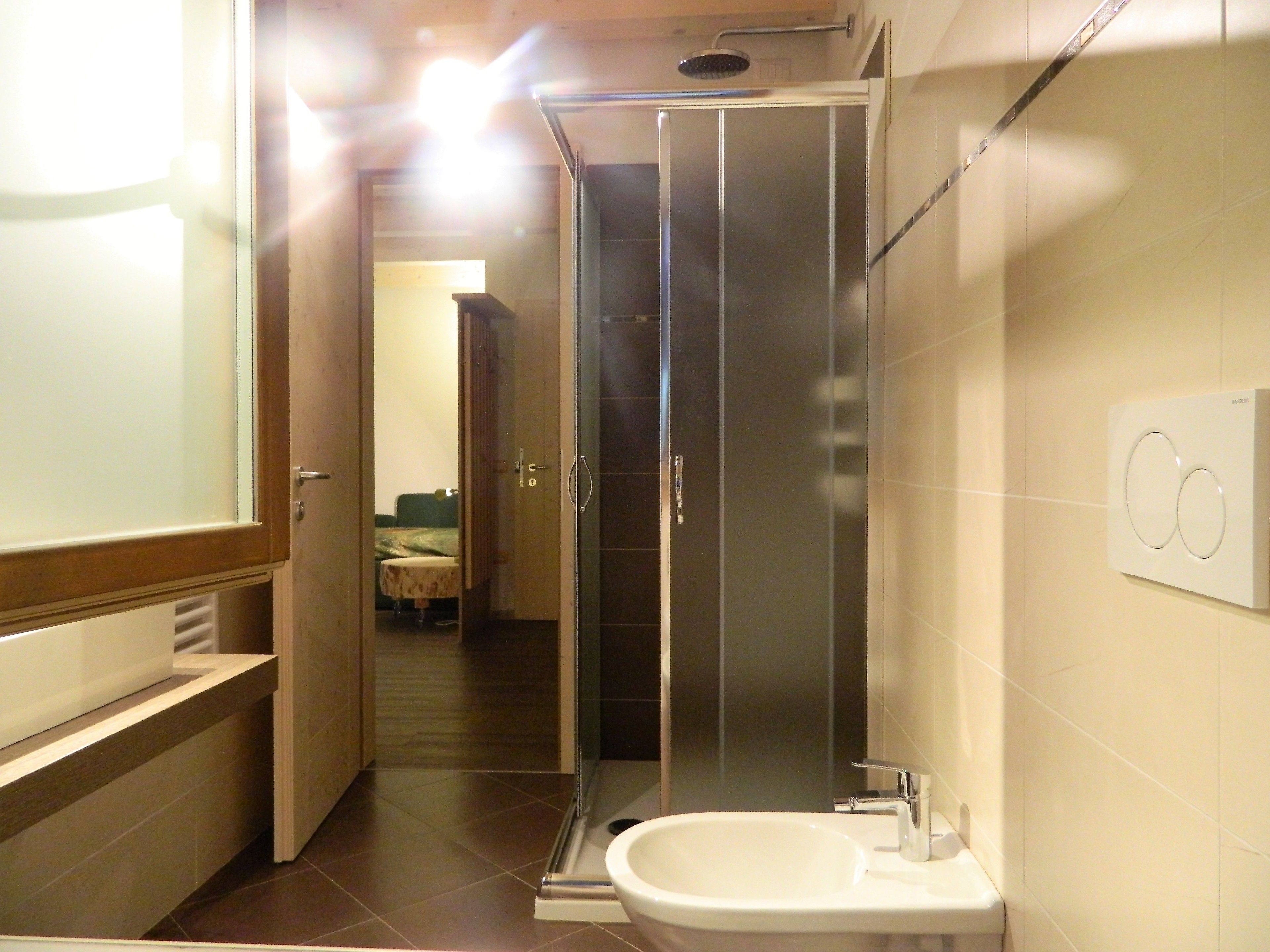 family room, 1 queen bed with sofa bed | bathroom | shower, free toiletries, hair dryer, towels