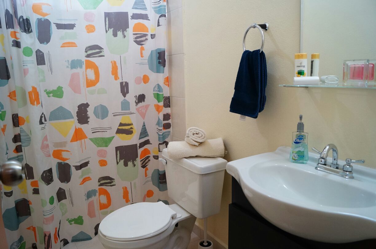 Shower, free toiletries, towels, toilet paper