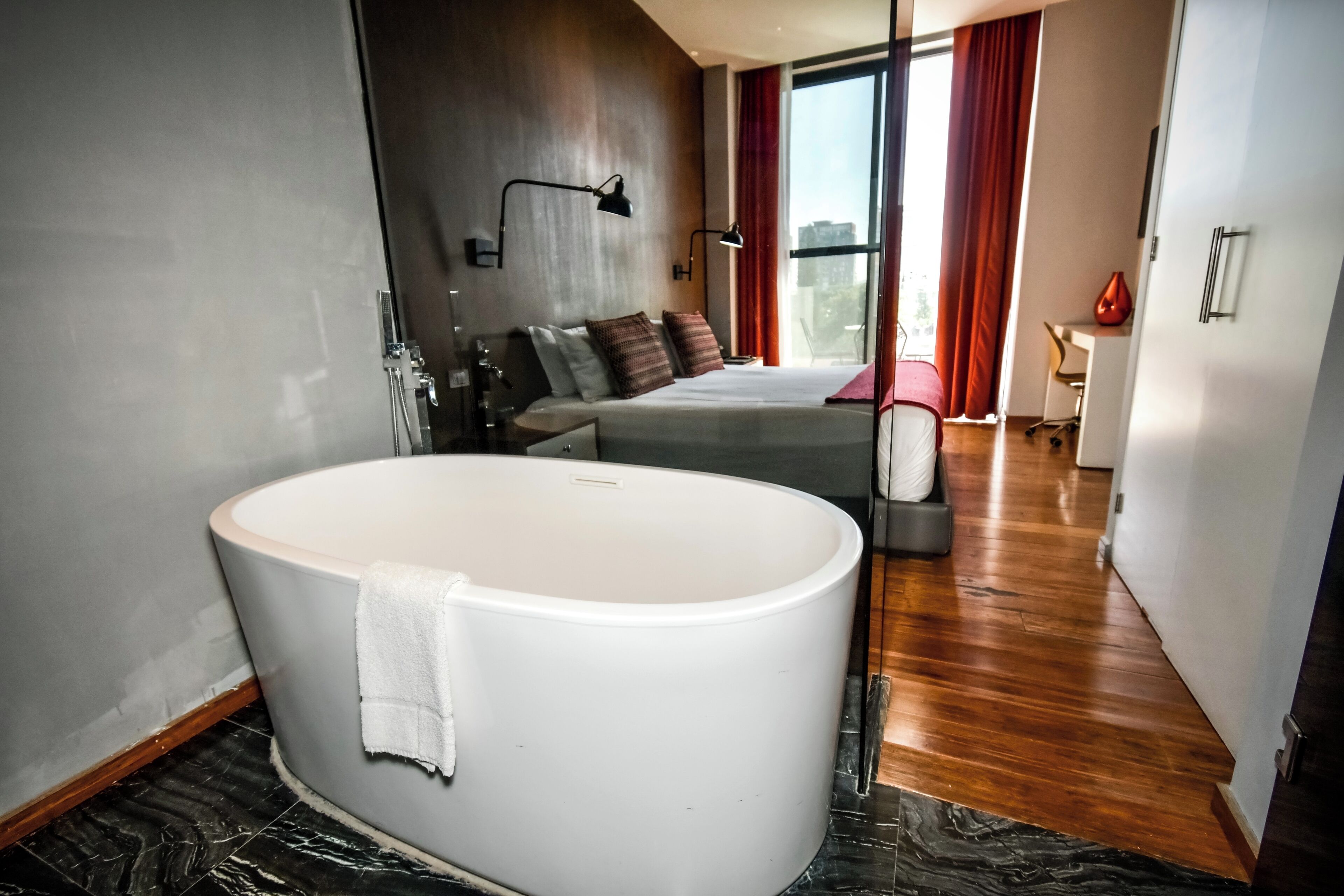 Junior Suite | Bathroom | Shower, rainfall showerhead, hair dryer, towels
