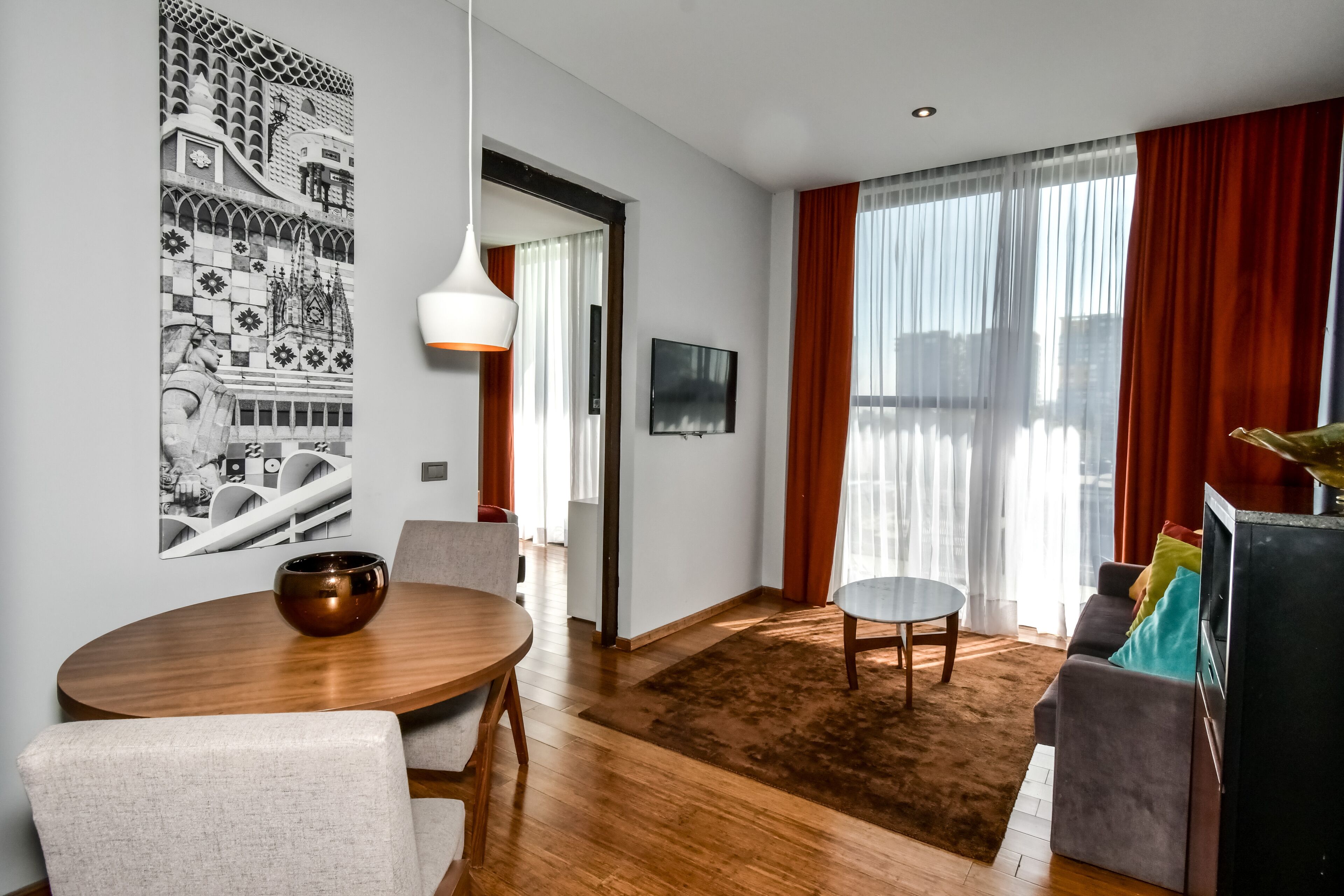 junior suite | living area | 42-inch led tv with cable channels, tv, ipod dock