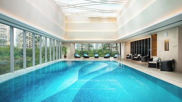 Indoor pool, open 6:00 AM to 10:00 PM, pool loungers