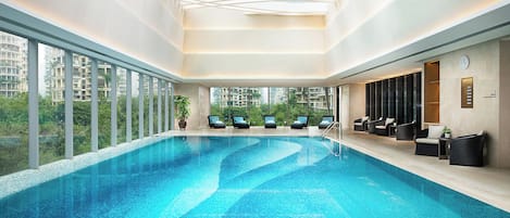 Indoor pool, open 7:00 AM to 10:00 PM, sun loungers