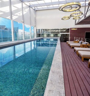 Indoor pool, open 6:00 AM to 8:00 PM, pool loungers