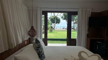 Luxo Frente ao Mar | Frigobar, cofres nos quartos, Wi-Fi de cortesia, roupa de cama