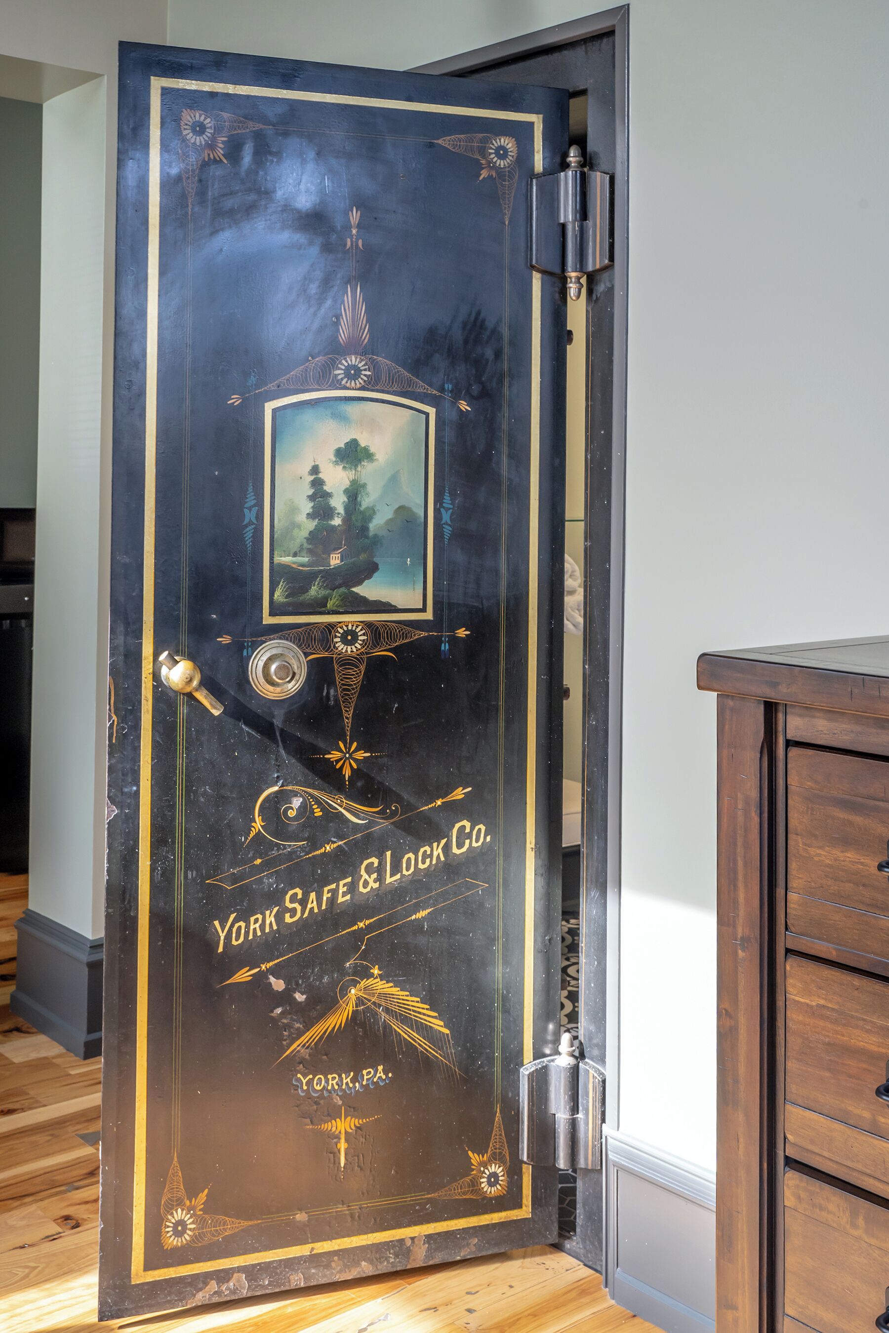 A door with intricate designs and the text "York Safe & Lock Co."