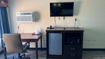 Desk, laptop workspace, blackout drapes, soundproofing