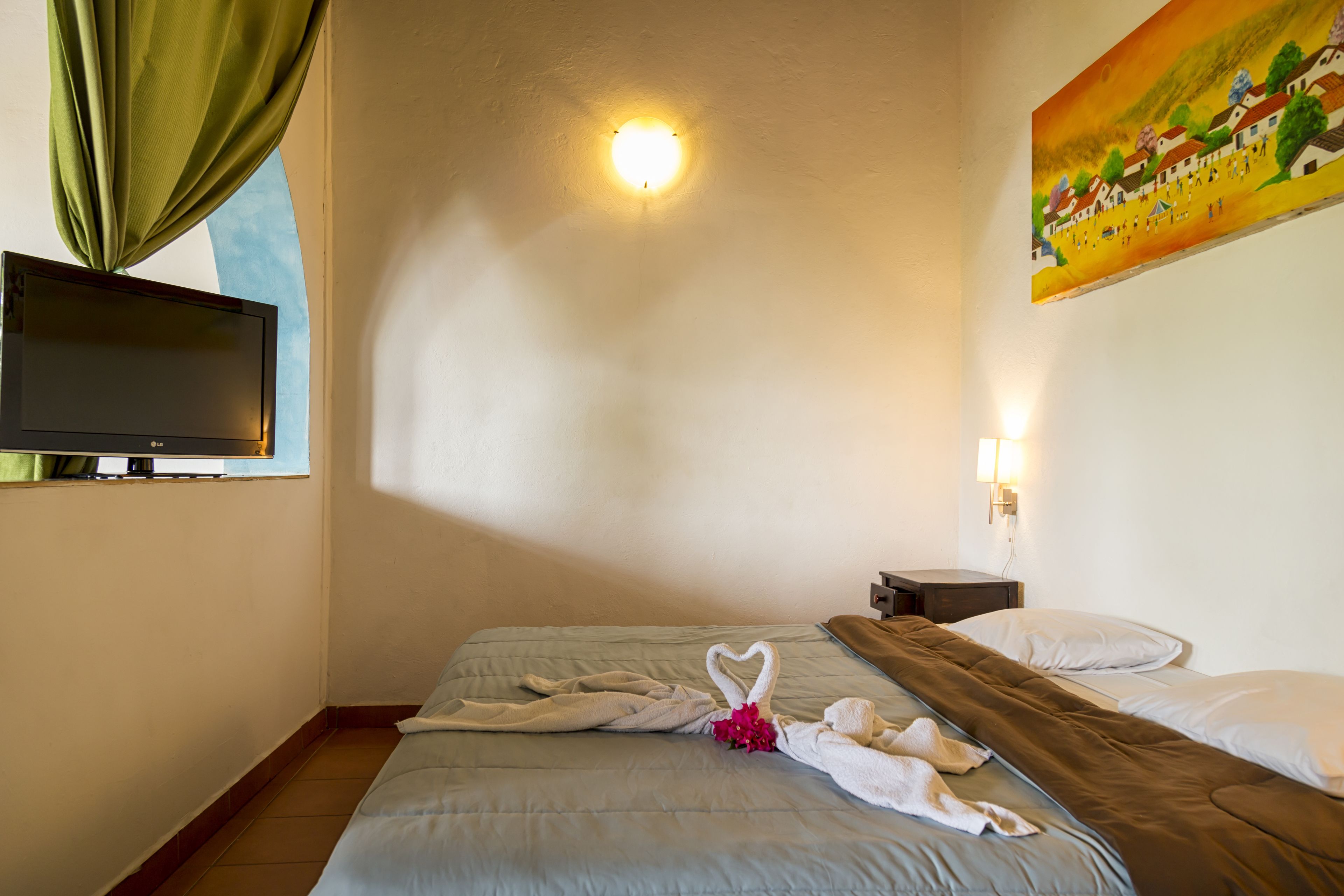 comfort room, pool view, tower | iron/ironing board, free cots/infant beds, free rollaway beds, free wifi