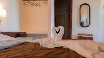Iron/ironing board, cribs (free), rollaway beds (free), WiFi (free)