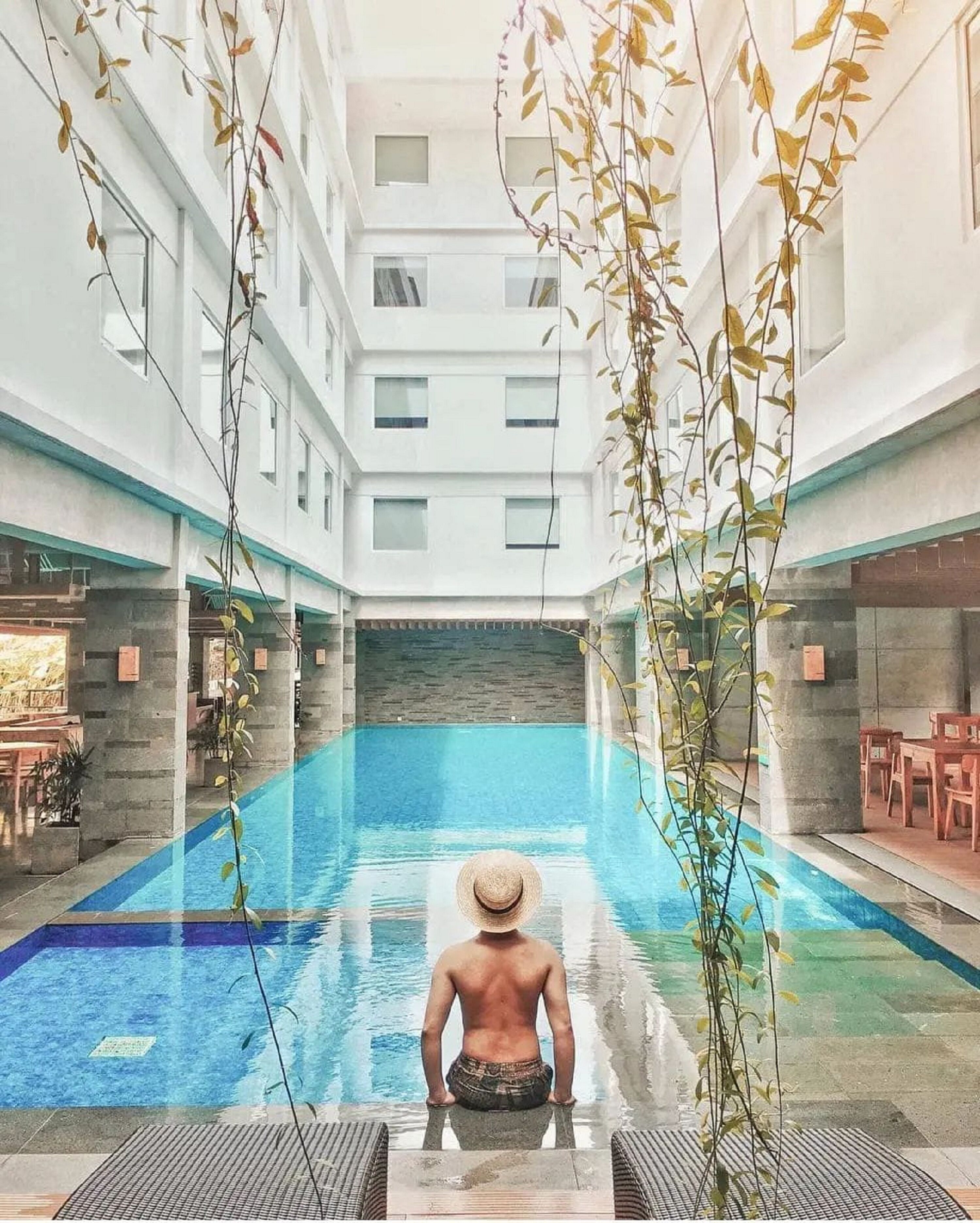 Outdoor pool, open 6:00 AM to 9 PM, pool loungers