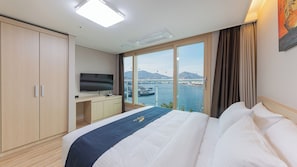 Luxury Suite with Ocean View (Weekend Fireworks + Aqua Planet Discount + Cruise Discount) | Premium bedding, down duvets, blackout curtains, bed sheets