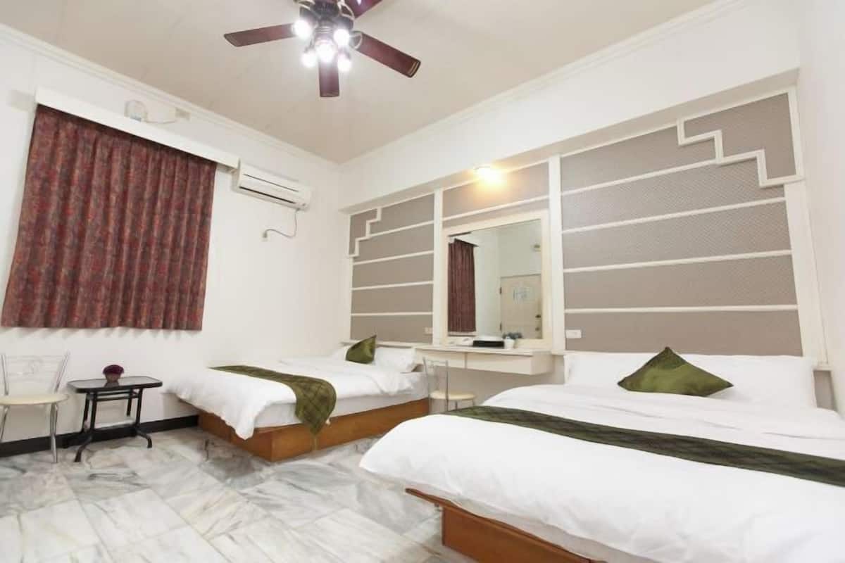 Desk, laptop workspace, blackout curtains, rollaway beds