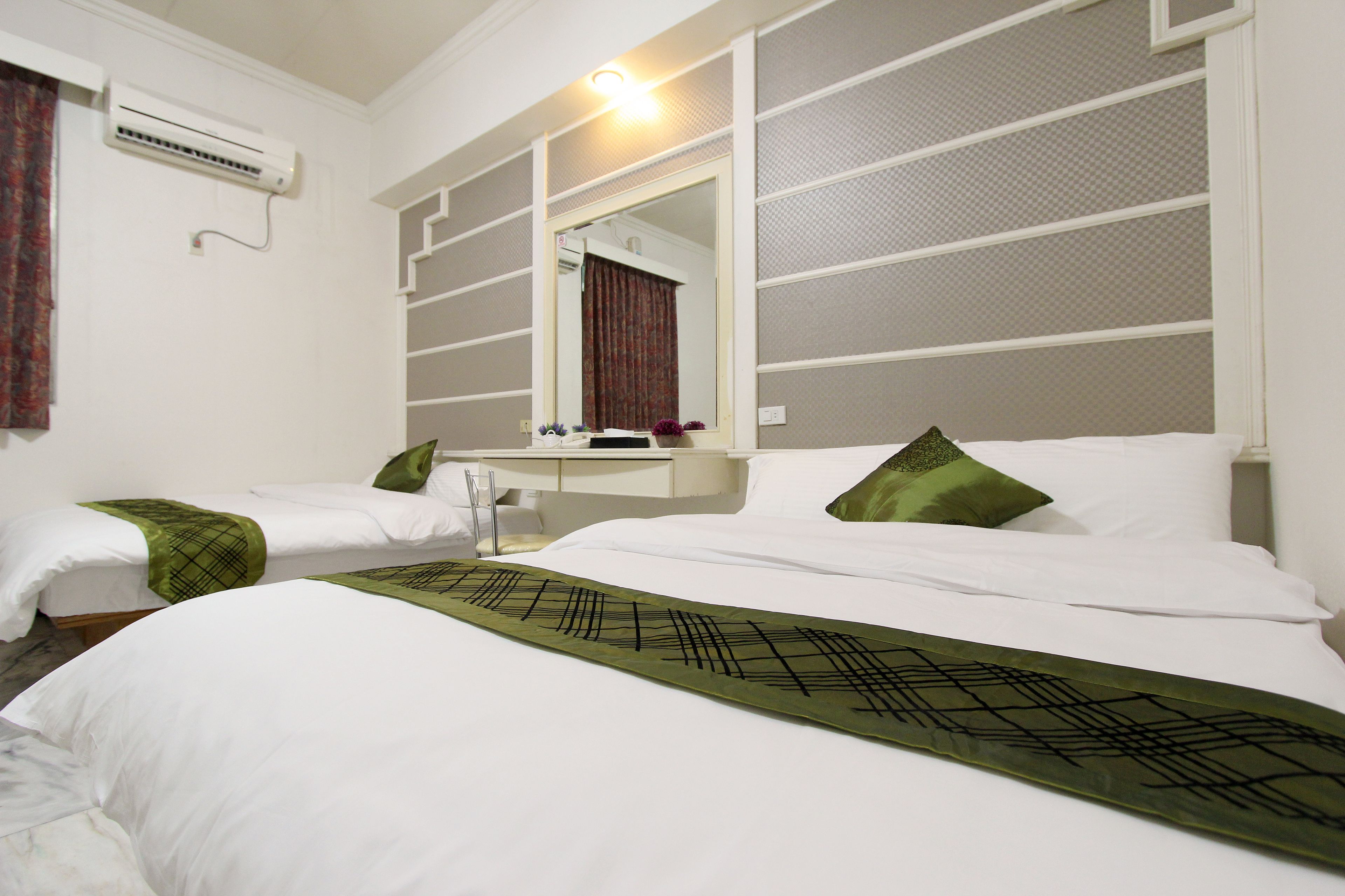 elite quadruple room | individually furnished, desk, laptop workspace, blackout curtains