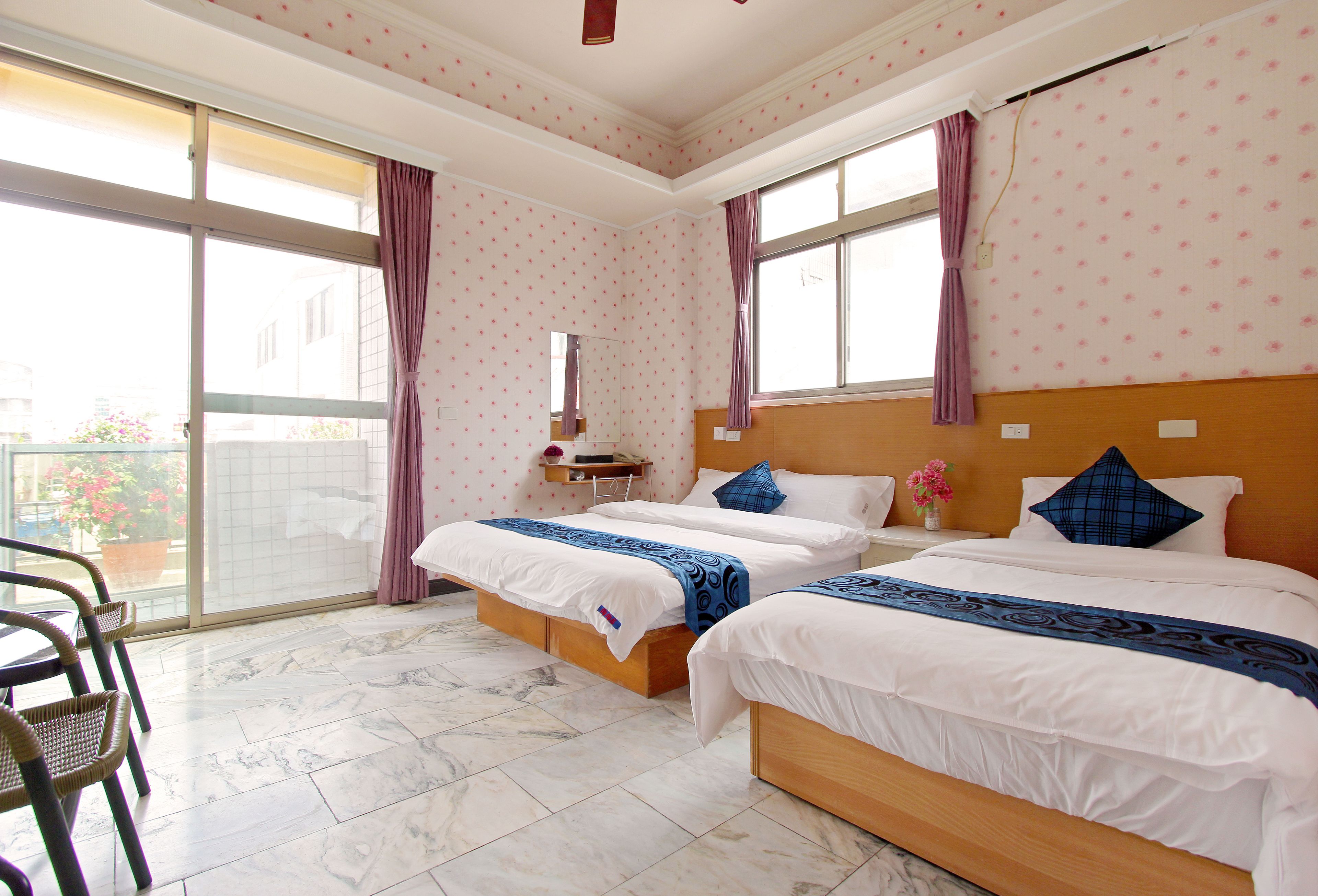 elite triple room | individually furnished, desk, laptop workspace, blackout curtains