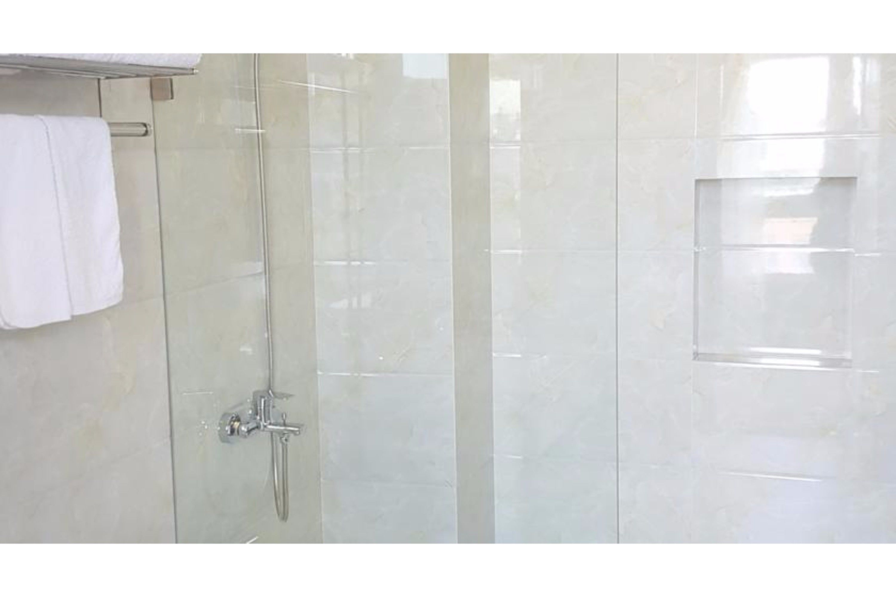 Shower, free toiletries, hair dryer, slippers
