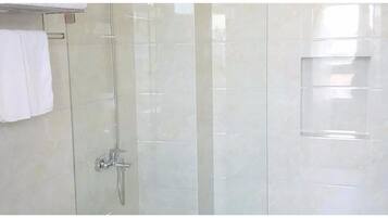 Shower, free toiletries, hair dryer, slippers