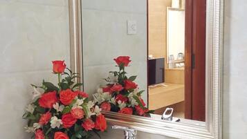 Shower, free toiletries, hair dryer, slippers