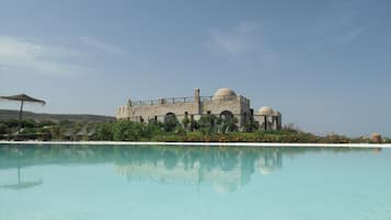 Outdoor pool, pool umbrellas, pool loungers