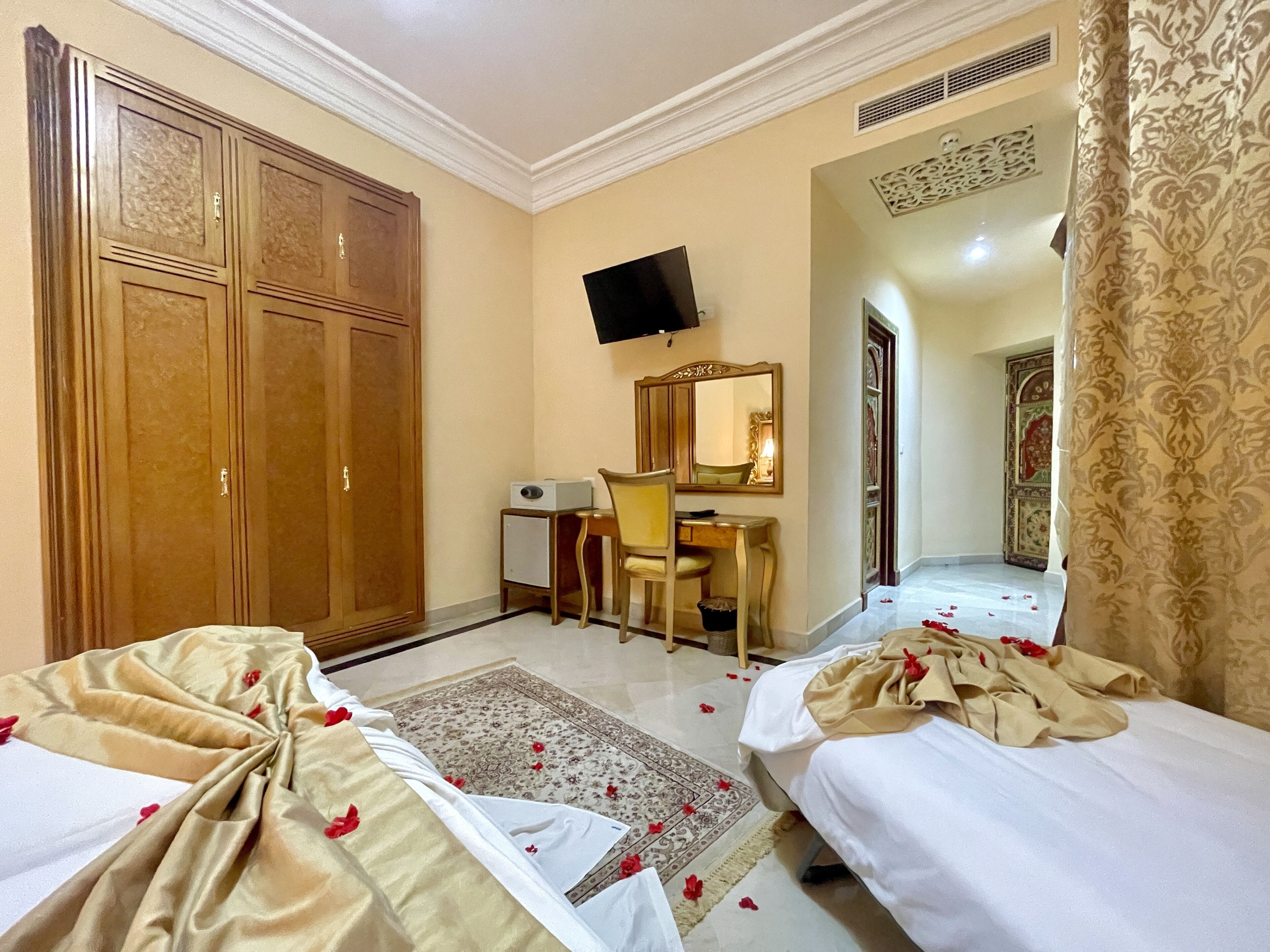 triple room | 1 bedroom, minibar, in-room safe, blackout curtains