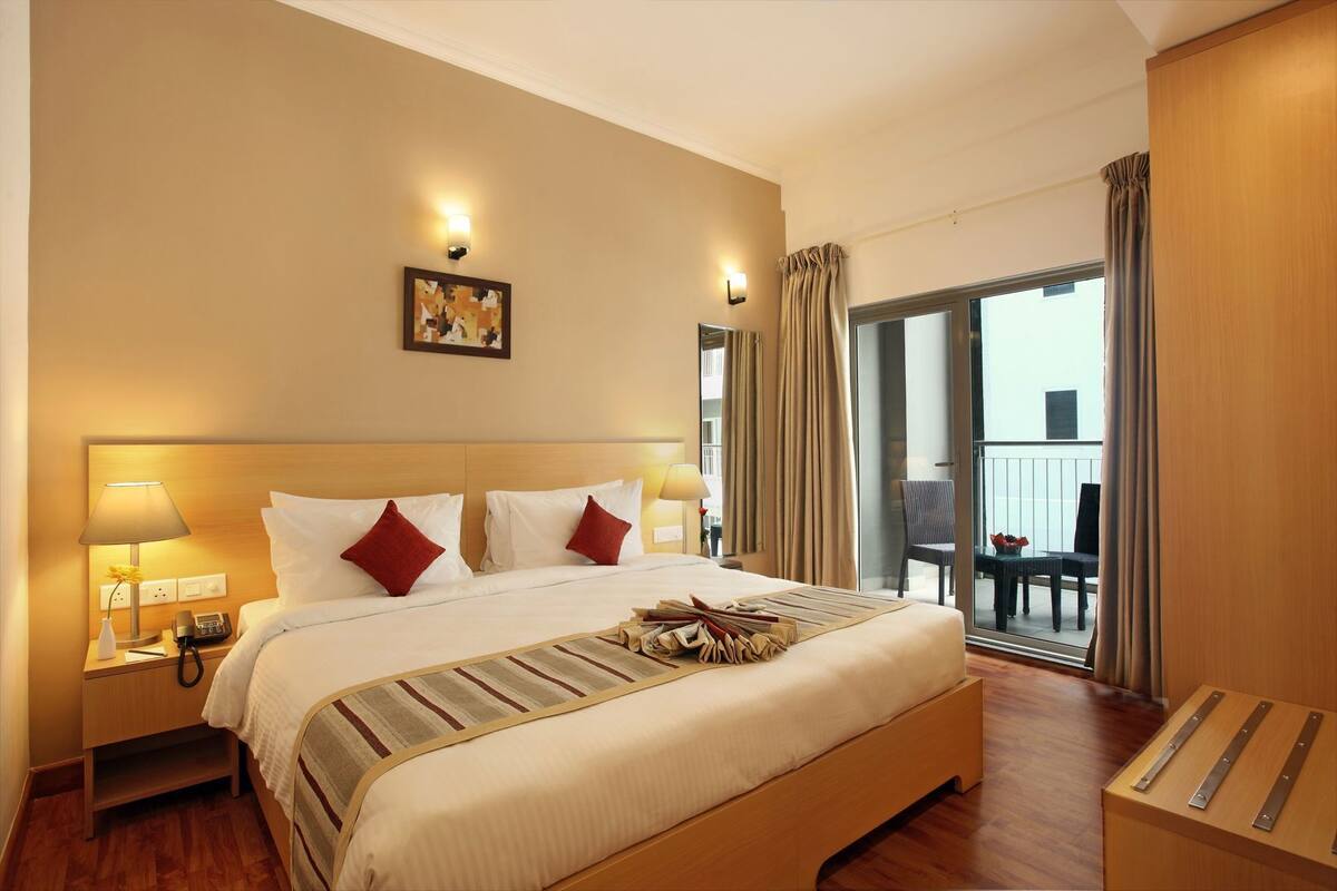 Premium bedding, down comforters, pillowtop beds, in-room safe