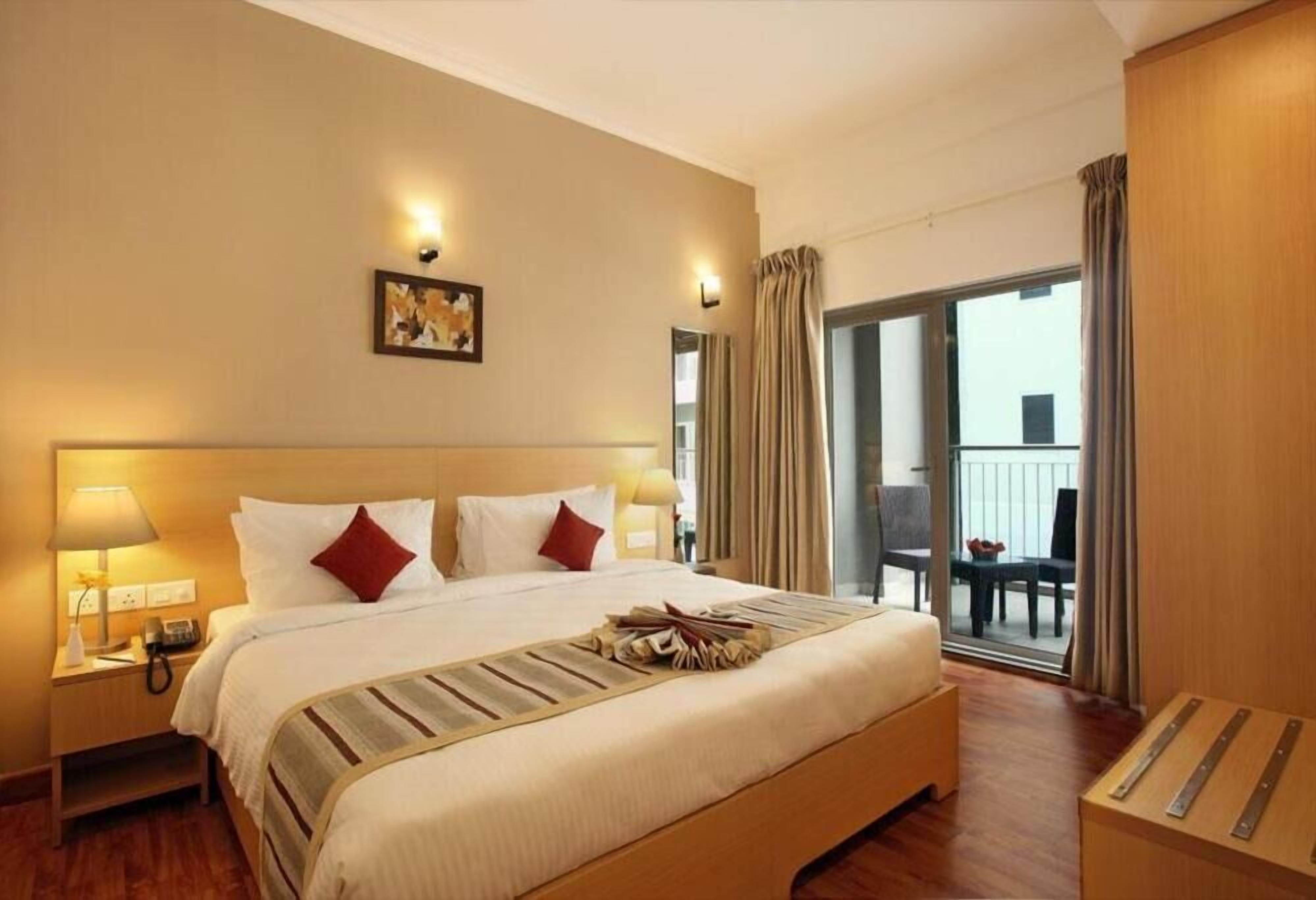 Premium bedding, down comforters, pillowtop beds, in-room safe