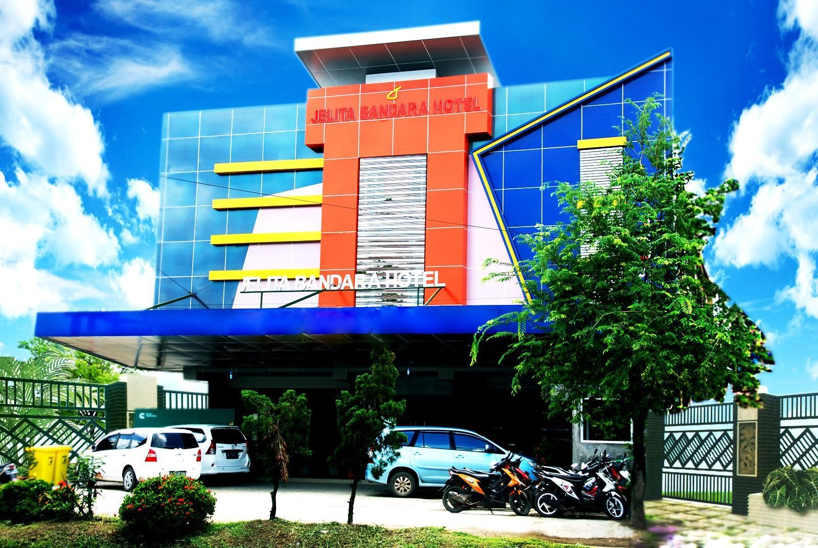 A hotel with a modern facade, featuring a prominent sign that reads "JELITA BANDARA HOTEL".