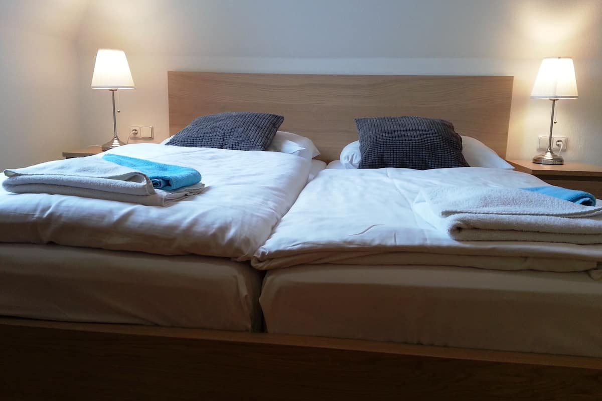 superior suite, 2 bedrooms, kitchenette, city view | in-room safe, desk, blackout curtains, soundproofing