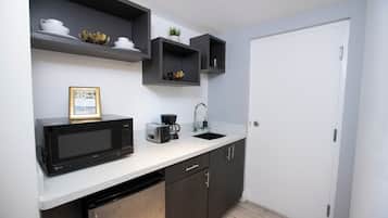 Fridge, microwave, toaster, cookware/dishes/utensils