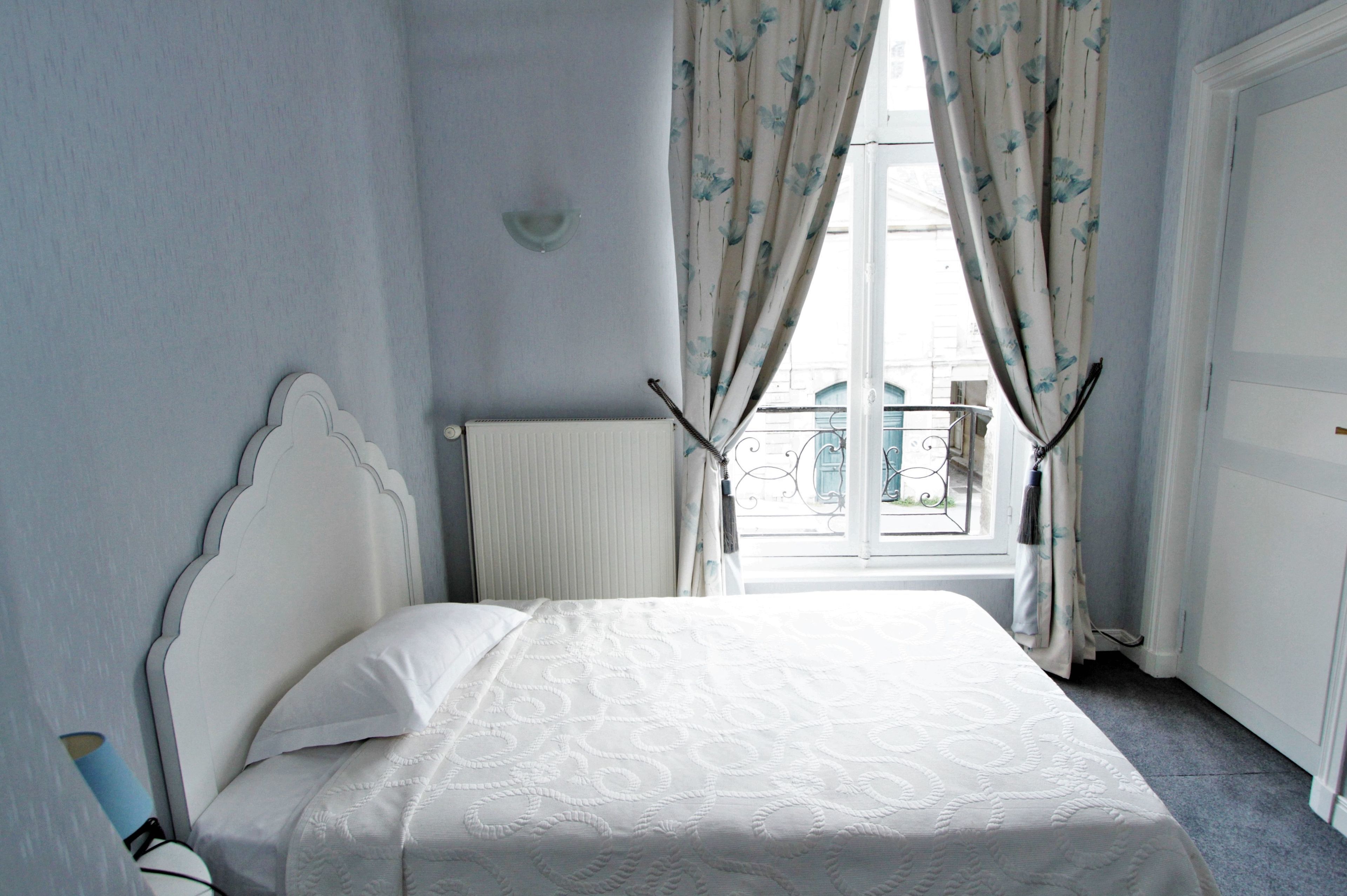 superior single room | premium bedding, individually decorated, blackout curtains