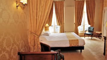 Family Room | Premium bedding, individually decorated, blackout drapes