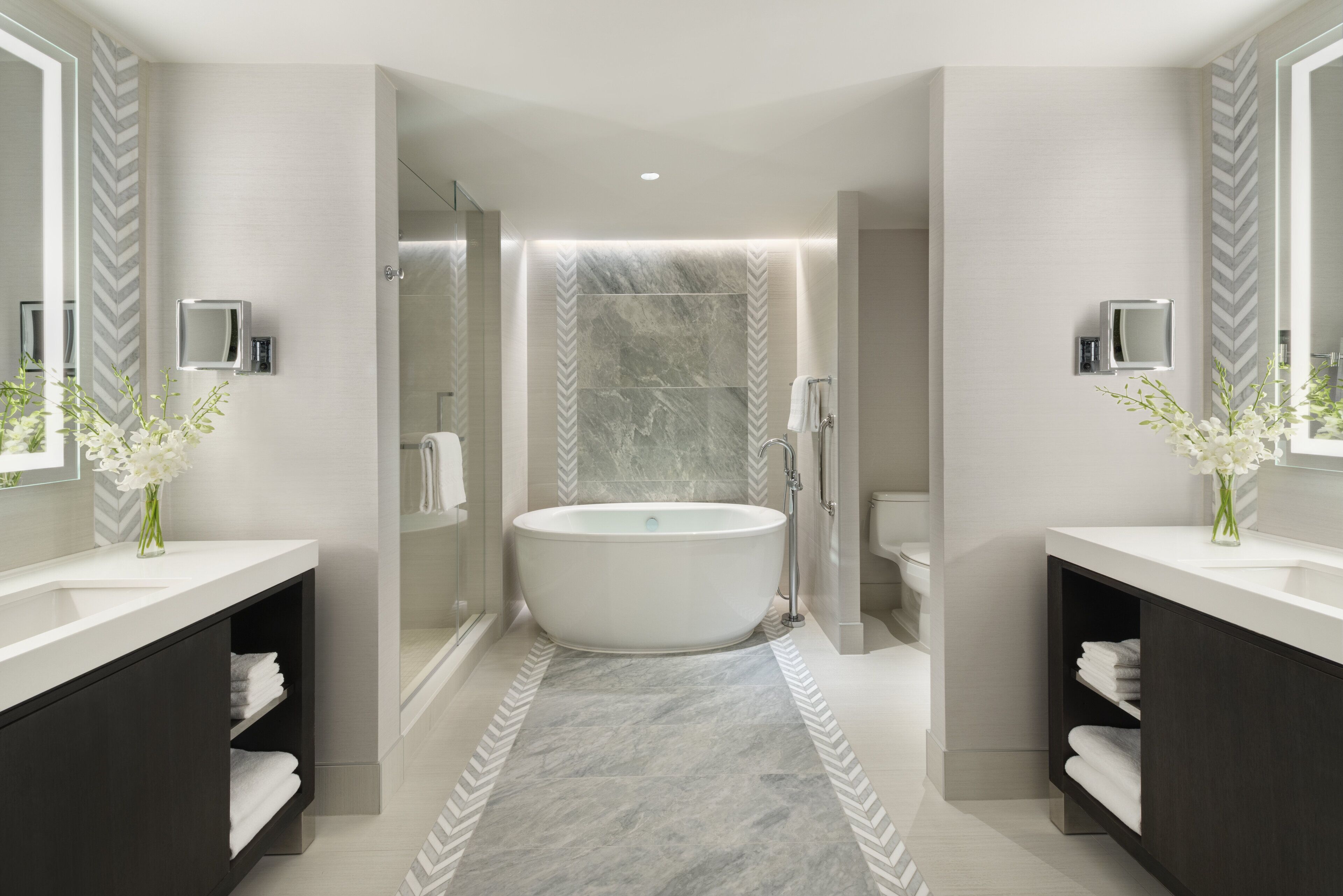 separate bathtub and shower, designer toiletries, hair dryer, bathrobes