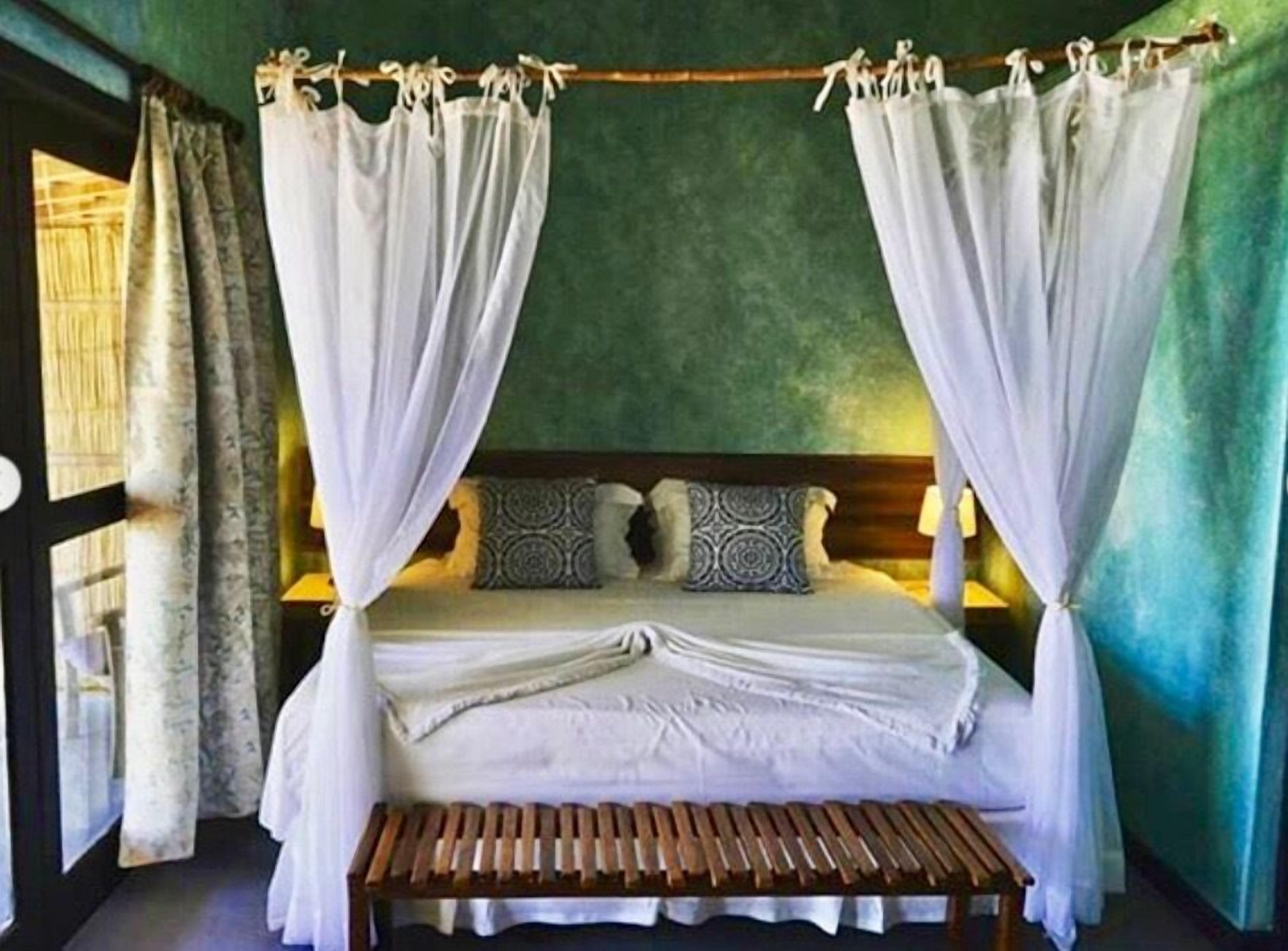 bungalow | premium bedding, memory-foam beds, minibar, individually decorated