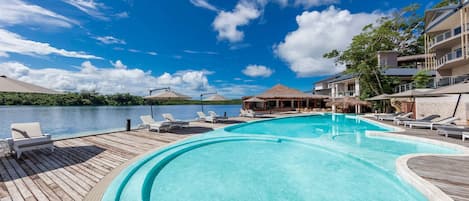 Outdoor pool, pool umbrellas, pool loungers