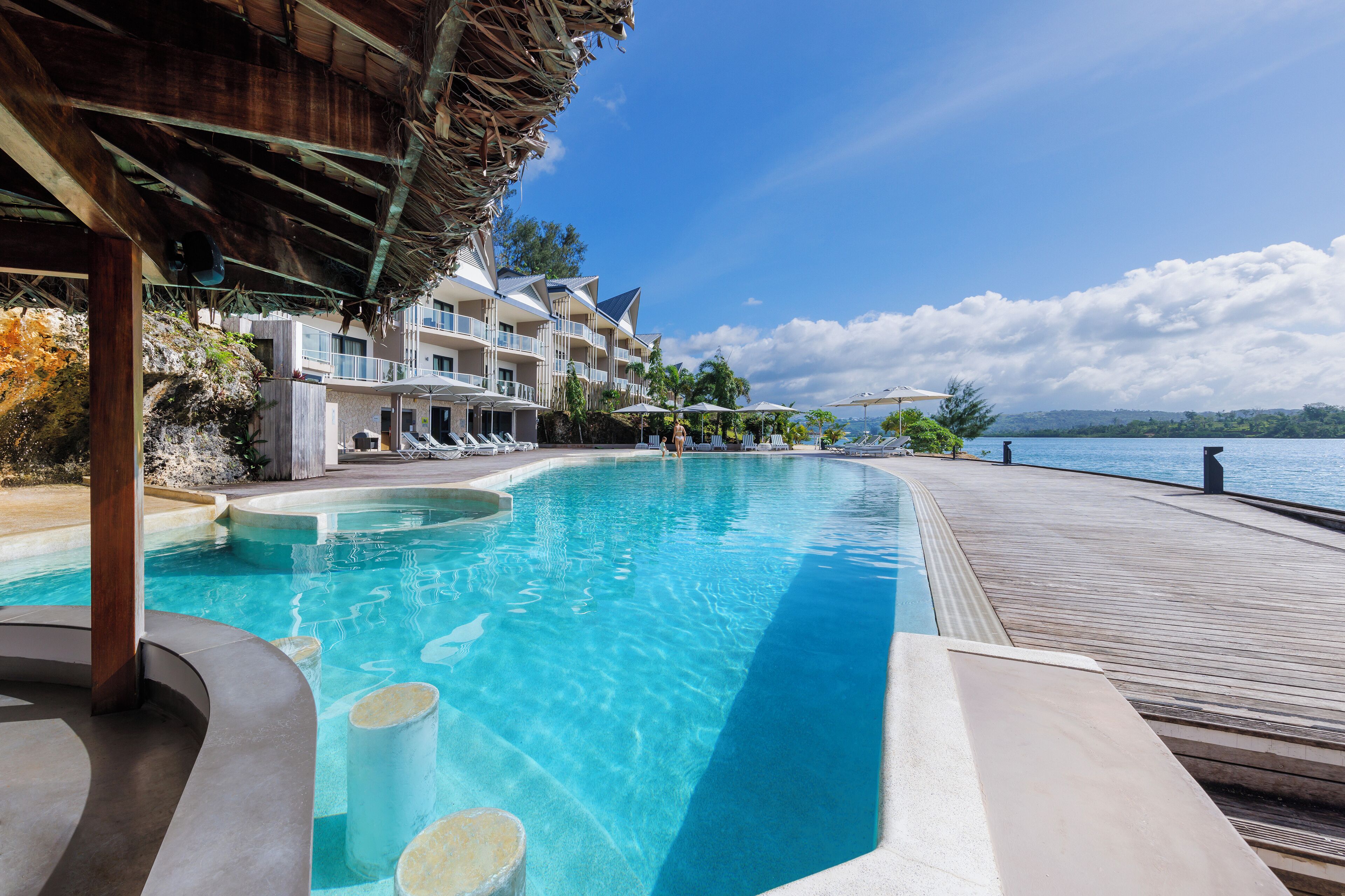 outdoor pool, pool umbrellas, pool loungers