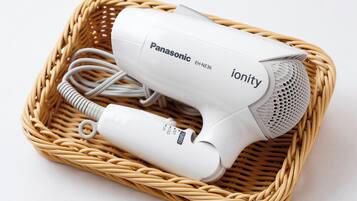 A Panasonic ionity hair dryer in a woven basket.