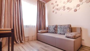 Suite Studio Confort, 1 grand lit et 1 canapé-lit | Coin séjour