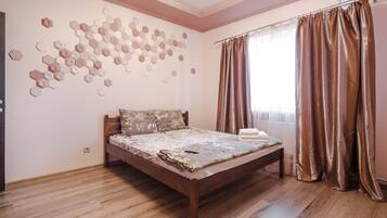 Suite Studio Confort, 1 grand lit et 1 canapé-lit