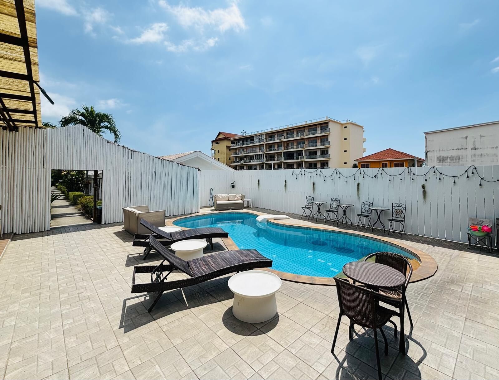Outdoor pool, open 6:00 AM to 10:00 AM, pool umbrellas, pool loungers