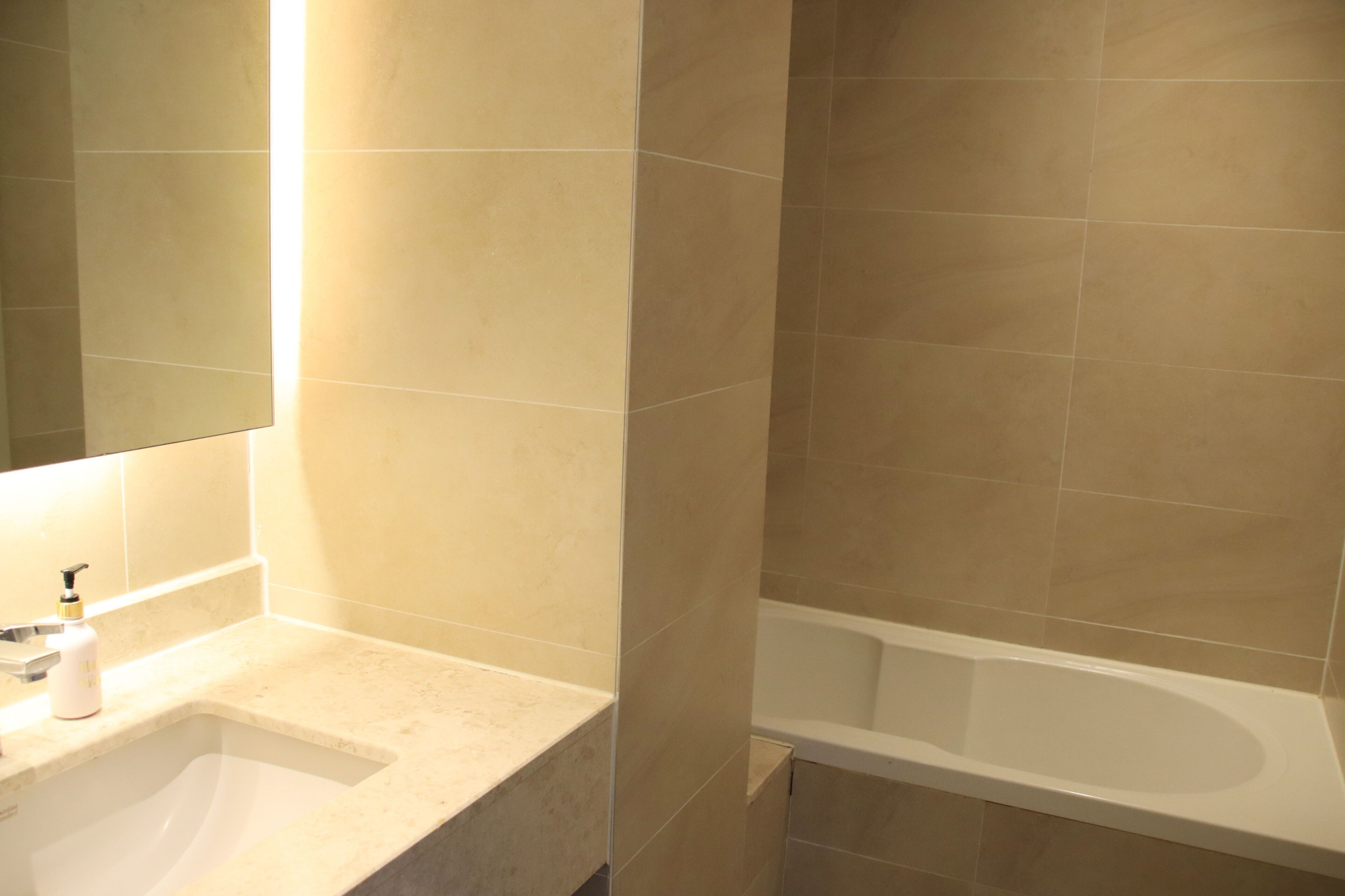 executive family room | bathroom | shower, hair dryer, bidet, towels